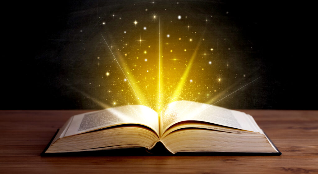 Open book w light emerging