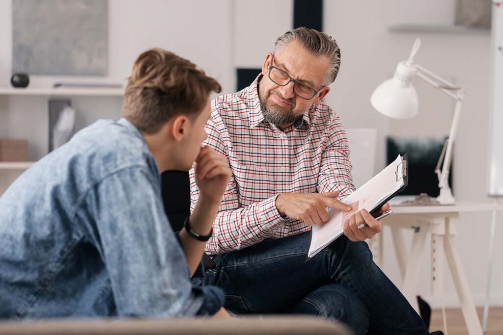 Person explaining something to another