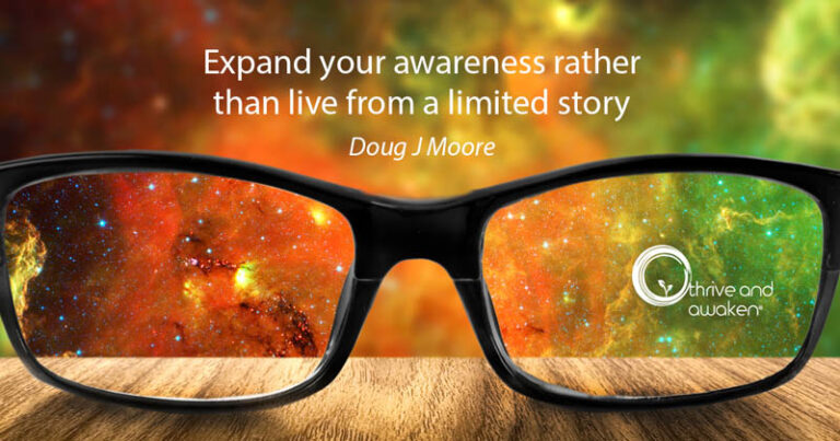 Looking the lens of a pair of glasses. Quote from Doug: Expand your awareness rather than live from a limited story