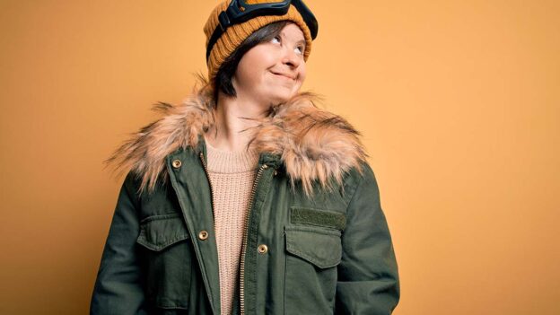 Person in a coat with fur collar