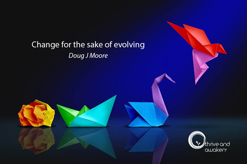 Origami cranes taking flight. Quote from Doug: Change for the sake of evolving