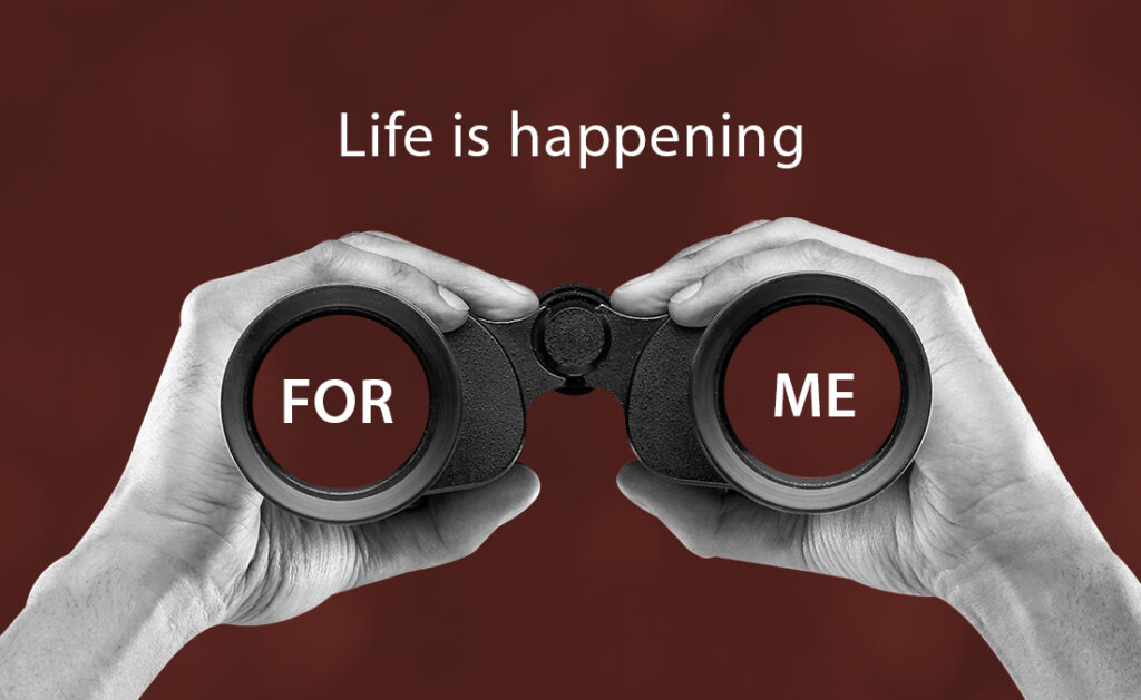 Two hands holding binoculars. Above them is a caption: Life is happening. In the left lens is FOR and in the right lens is ME
