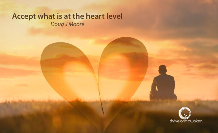 A man looking at a sunset with a big heart in the sky. Quote from Doug: Accept what is at the heart level