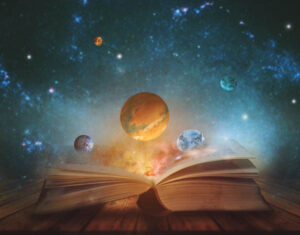 Open book with planets emerging