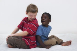 Two young boys, black and white
